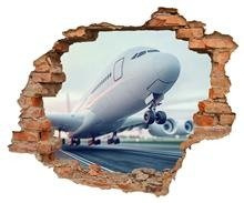 Naklejka na ścianę Dziura 3D Startujący samolot 0346