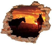 Naklejka na ścianę Dziura 3D Konie w blasku zachodzącego słońca 0425